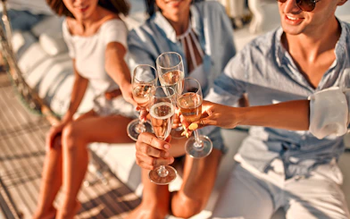 Guests toasting with champagne on a Split Riviera cruise.