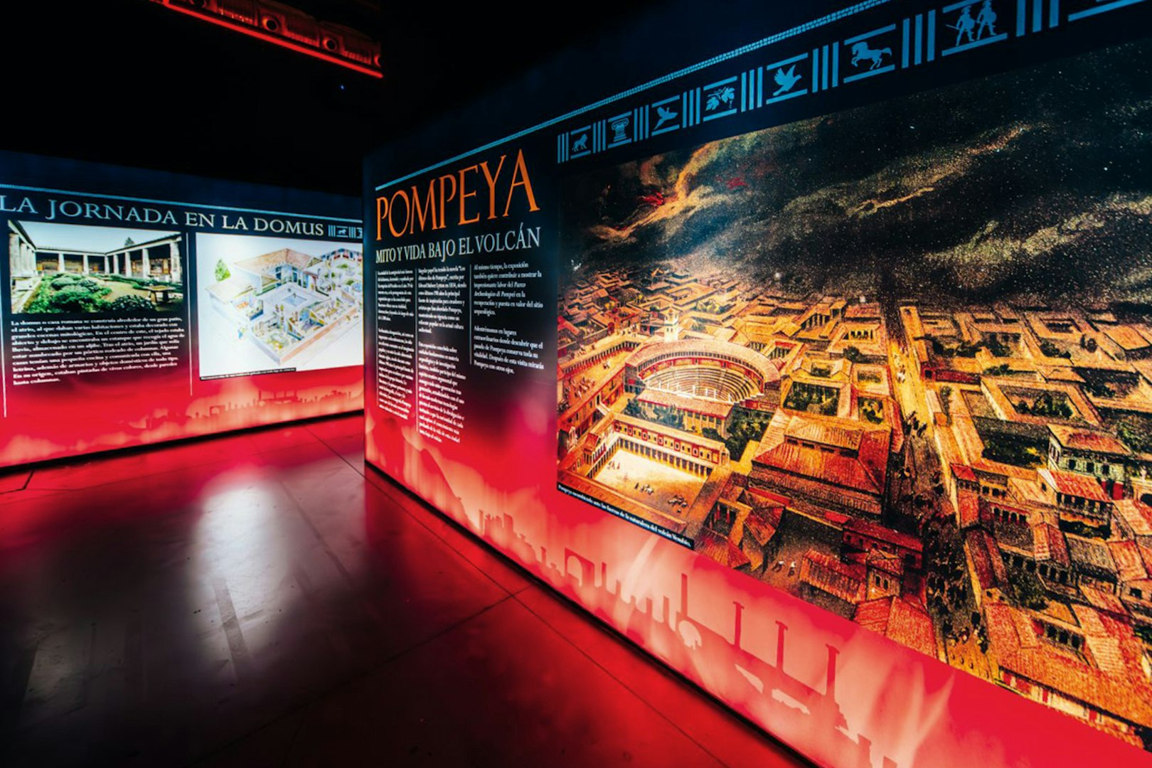 Exhibition panels depicting the last days of Pompeii with historical text and illustrations.