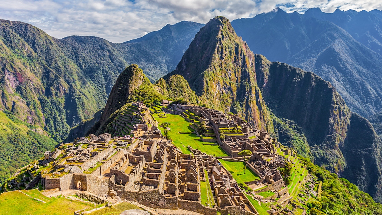 Machu Picchu ruins with Huayna Picchu mountain in the background, Peru.