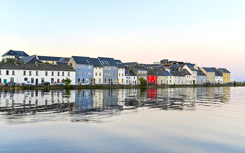 Colorful houses along the waterfront in Galway City, Ireland.