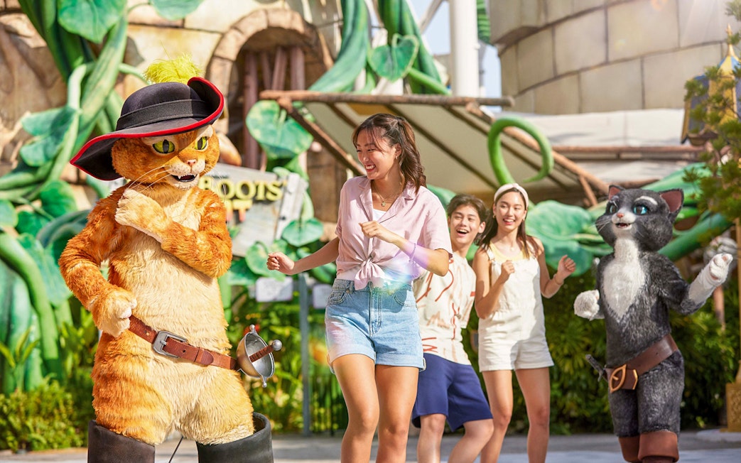 Characters from Puss in Boots with visitors at Universal Studios Singapore.
