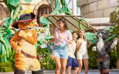 Characters from Puss in Boots with visitors at Universal Studios Singapore.