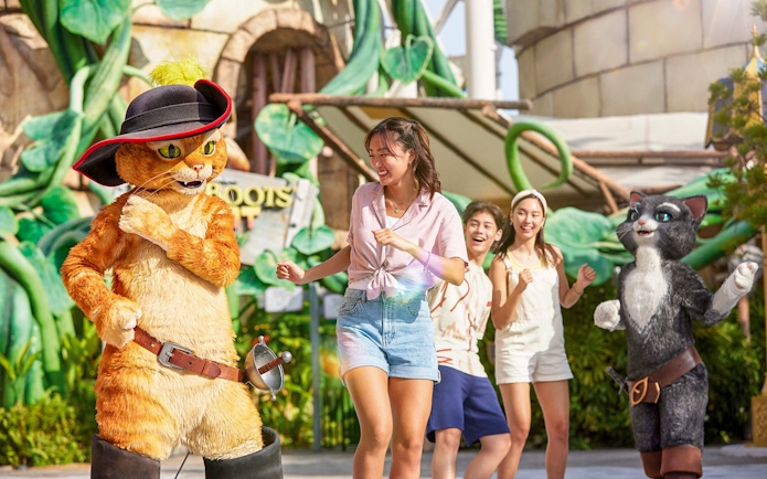 Characters from Puss in Boots with visitors at Universal Studios Singapore.