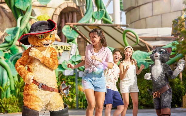Characters from Puss in Boots with visitors at Universal Studios Singapore.