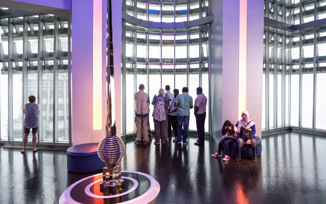 Visitors enjoying the view from the observation deck of Petronas Twin Towers, Kuala Lumpur.