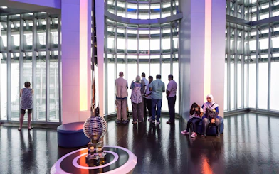 Visitors enjoying the view from the observation deck of Petronas Twin Towers, Kuala Lumpur.