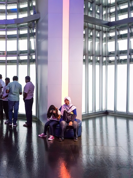 Visitors enjoying the view from the observation deck of Petronas Twin Towers, Kuala Lumpur.