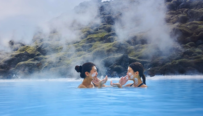 Tourists relaxing in geothermal waters at Blue Lagoon, Reykjavik, Iceland.