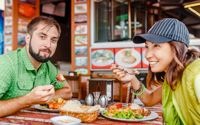 Couple enjoying lunch at a local restaurant during a guided tour of Istanbul Old City.