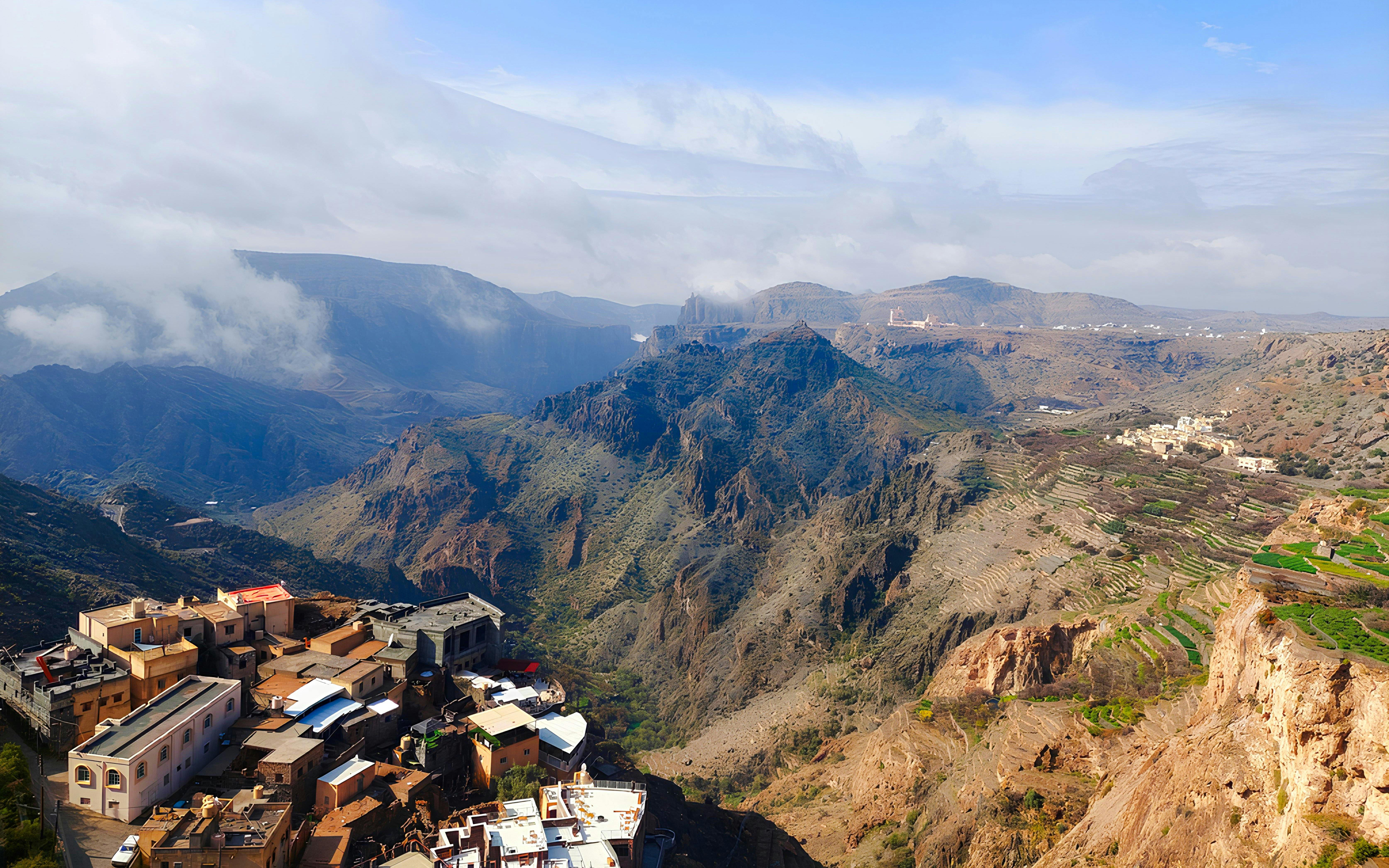 Jebel Akhdar mountain landscape with terraced fields and village, Muscat.