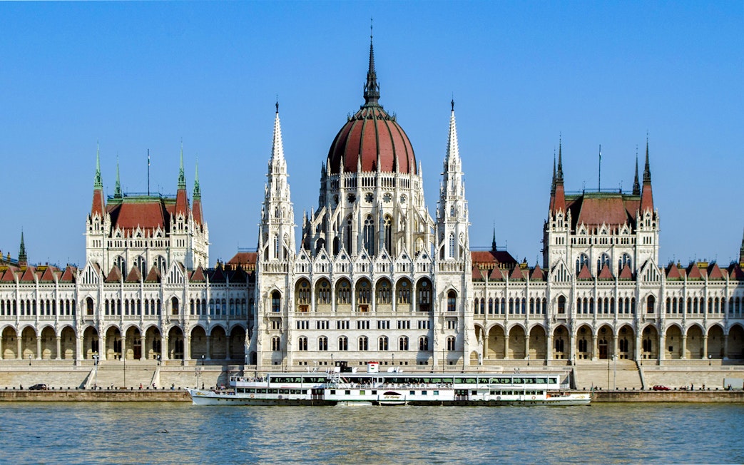 Booze cruise boat on the Danube River by the Hungarian Parliament, Budapest.