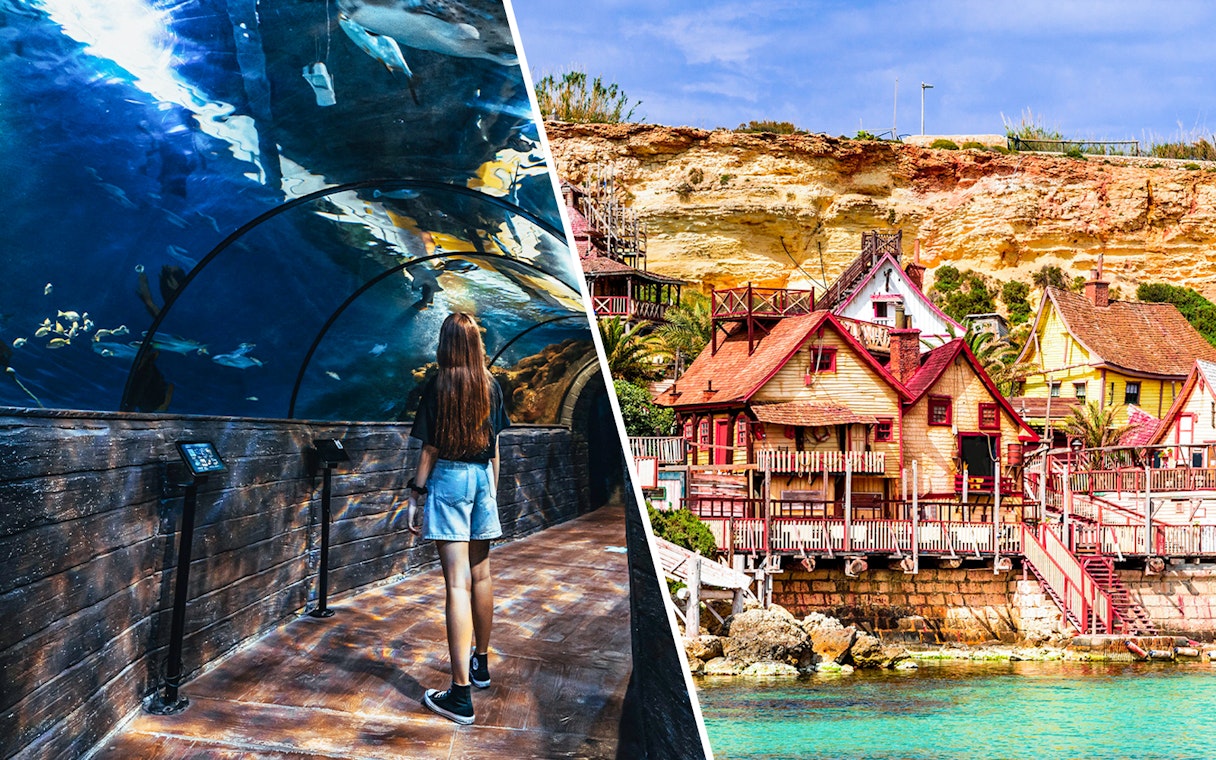 Visitor in Malta National Aquarium tunnel and colorful buildings of Popeye Village.