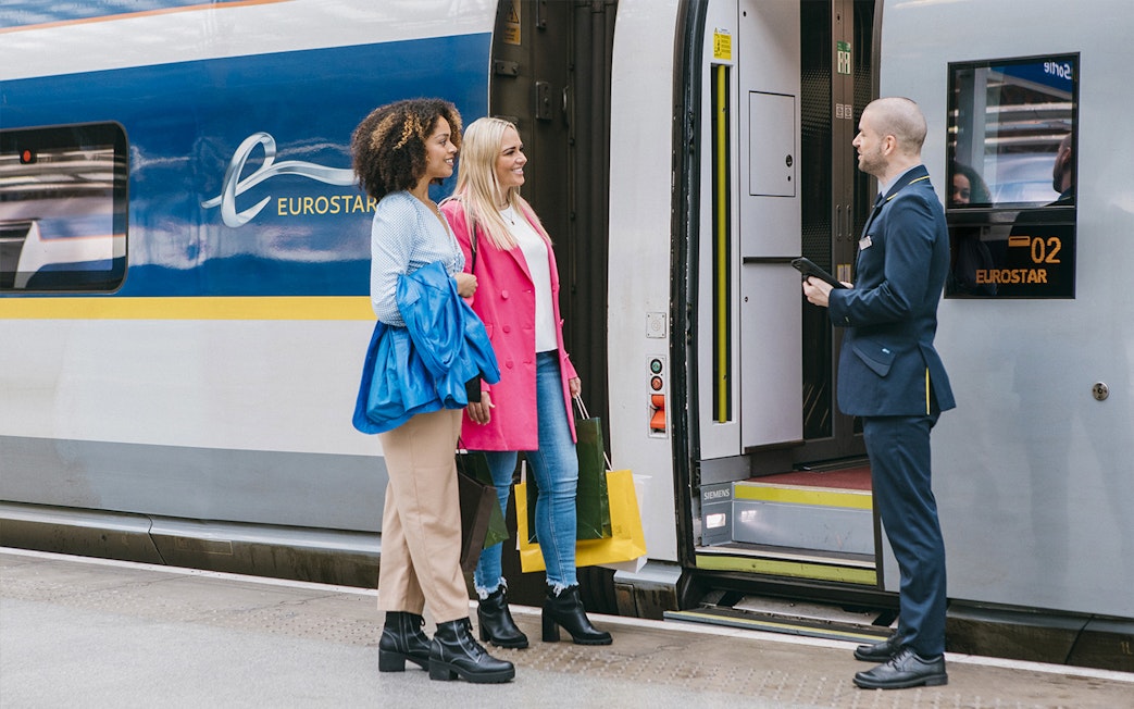 Travellers boarding Eurostar train with Interrail Global Pass.