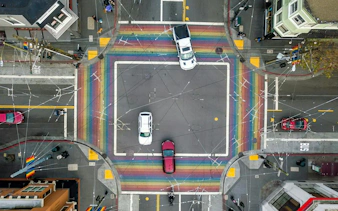 Aerial view of rainbow crosswalks at Castro District intersection, San Francisco.