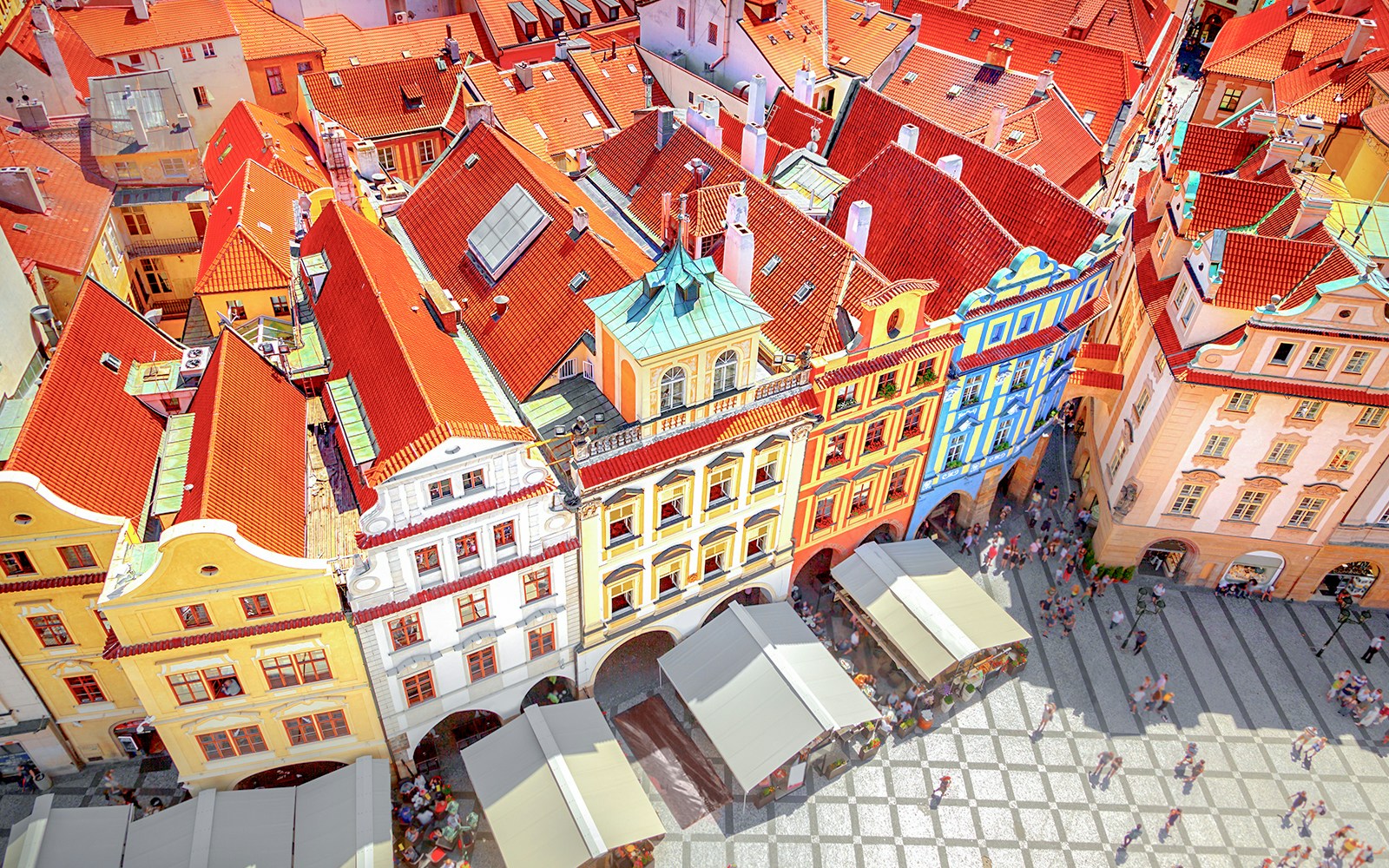 View from Astronomical Clock Tower, Prague, showcasing historic buildings and homes.