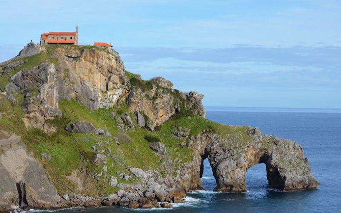 San Juan de Gaztelugatxe islet with chapel on rocky cliff, Basque Country, Spain.