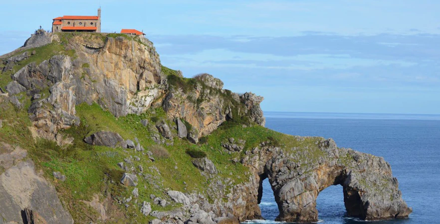 San Juan de Gaztelugatxe islet with chapel on rocky cliff, Basque Country, Spain.