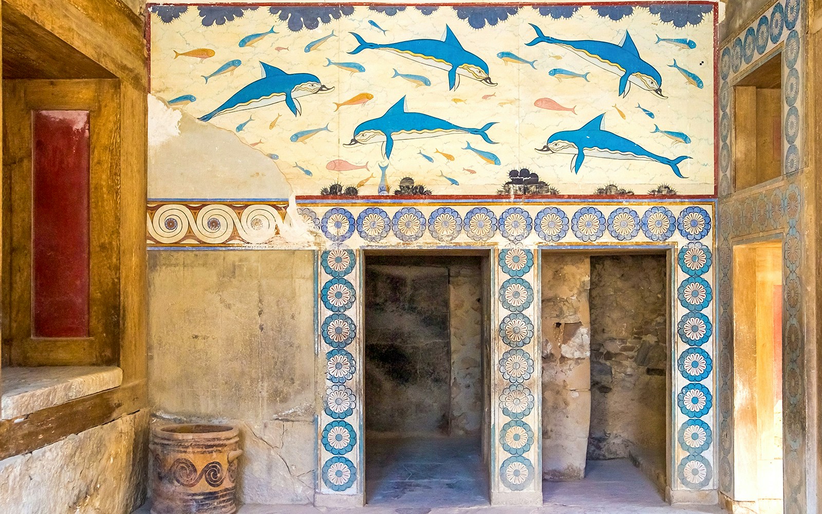 Knossos Palace House of the Frescoes with vibrant dolphin paintings, Crete, Greece.