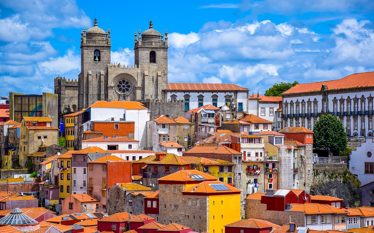 Porto Cathedral and colorful buildings in Porto, Portugal.
