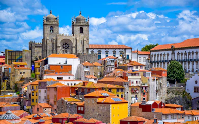 Porto Cathedral and colorful buildings in Porto, Portugal.