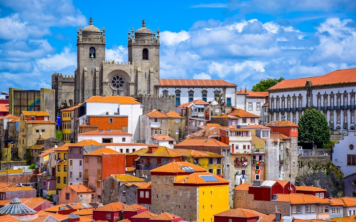 Porto Cathedral and colorful buildings in Porto, Portugal.