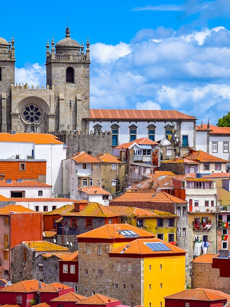 Porto Cathedral and colorful buildings in Porto, Portugal.