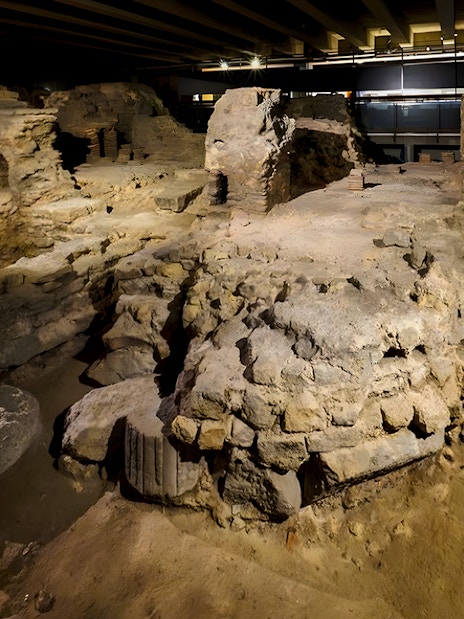 Notre Dame Crypt interior showcasing ancient stone ruins and archaeological remains.