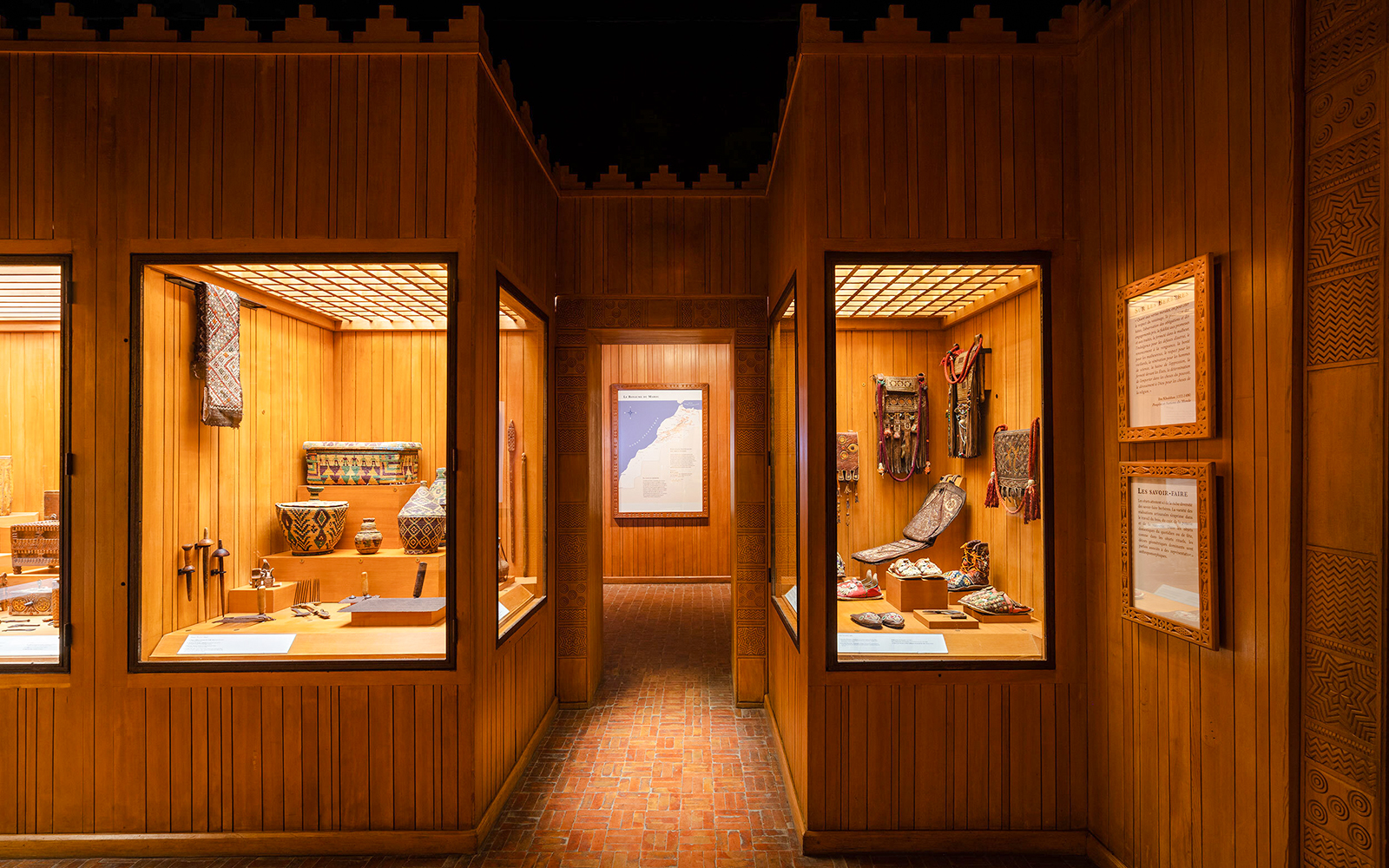 Berber artifacts displayed in wooden showcases at the Berber Museum, Marrakech.