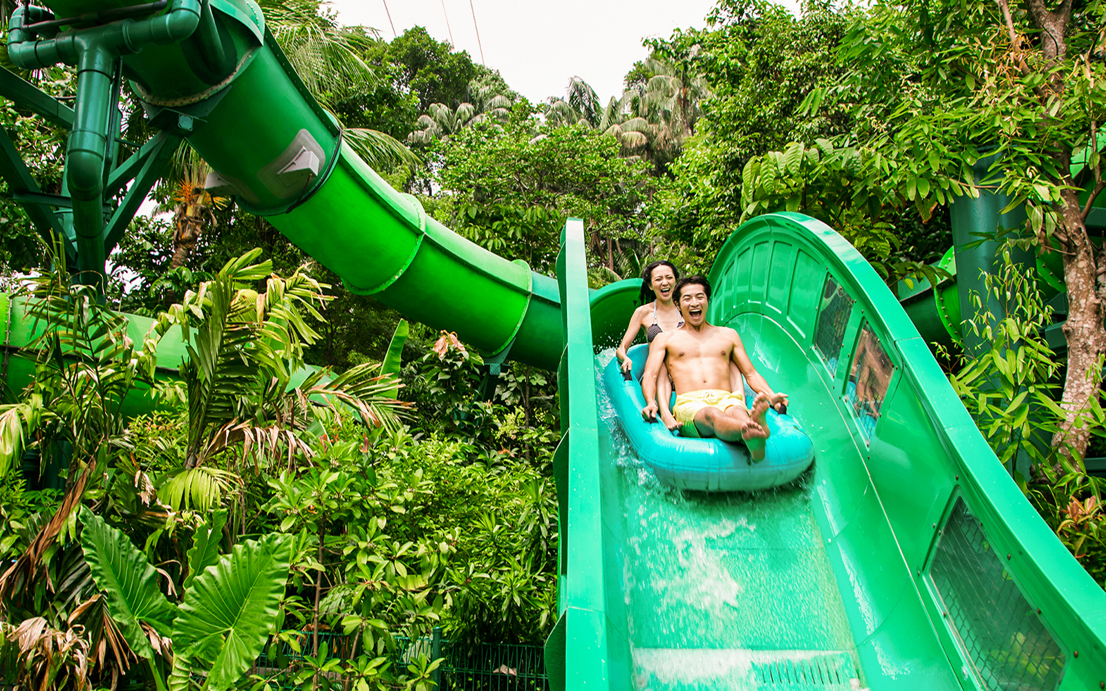 People enjoying the Riptide Rocket ride at Adventure Cove Waterpark™.