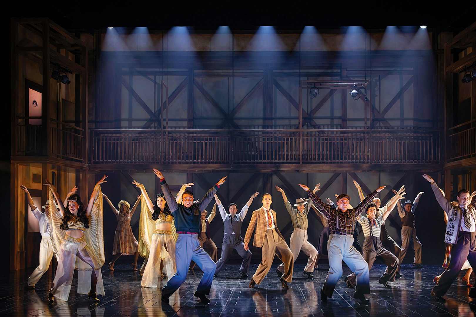Performers dancing on stage in a theatrical production on Sunset Boulevard.
