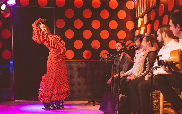 Flamenco dancer performing at Los Tarantos Flamenco Show in Barcelona.