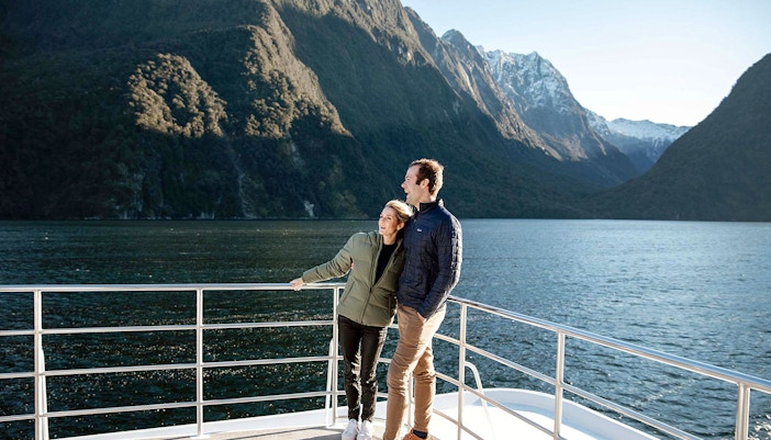 Couple enjoying the view at Milford Sound