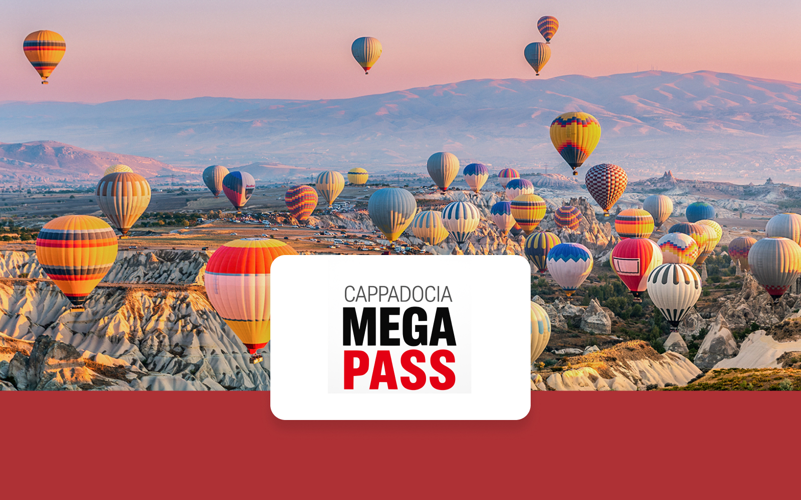 Hot air balloons over Cappadocia's unique rock formations at sunrise.