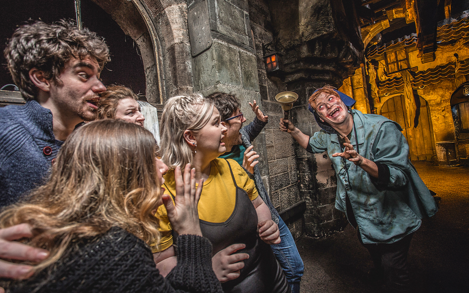 Group reacting to actor portraying the Foul Clenger at Mary King's Close, Edinburgh.
