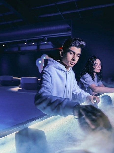 Visitors engaging with interactive exhibits at Scienceworks.