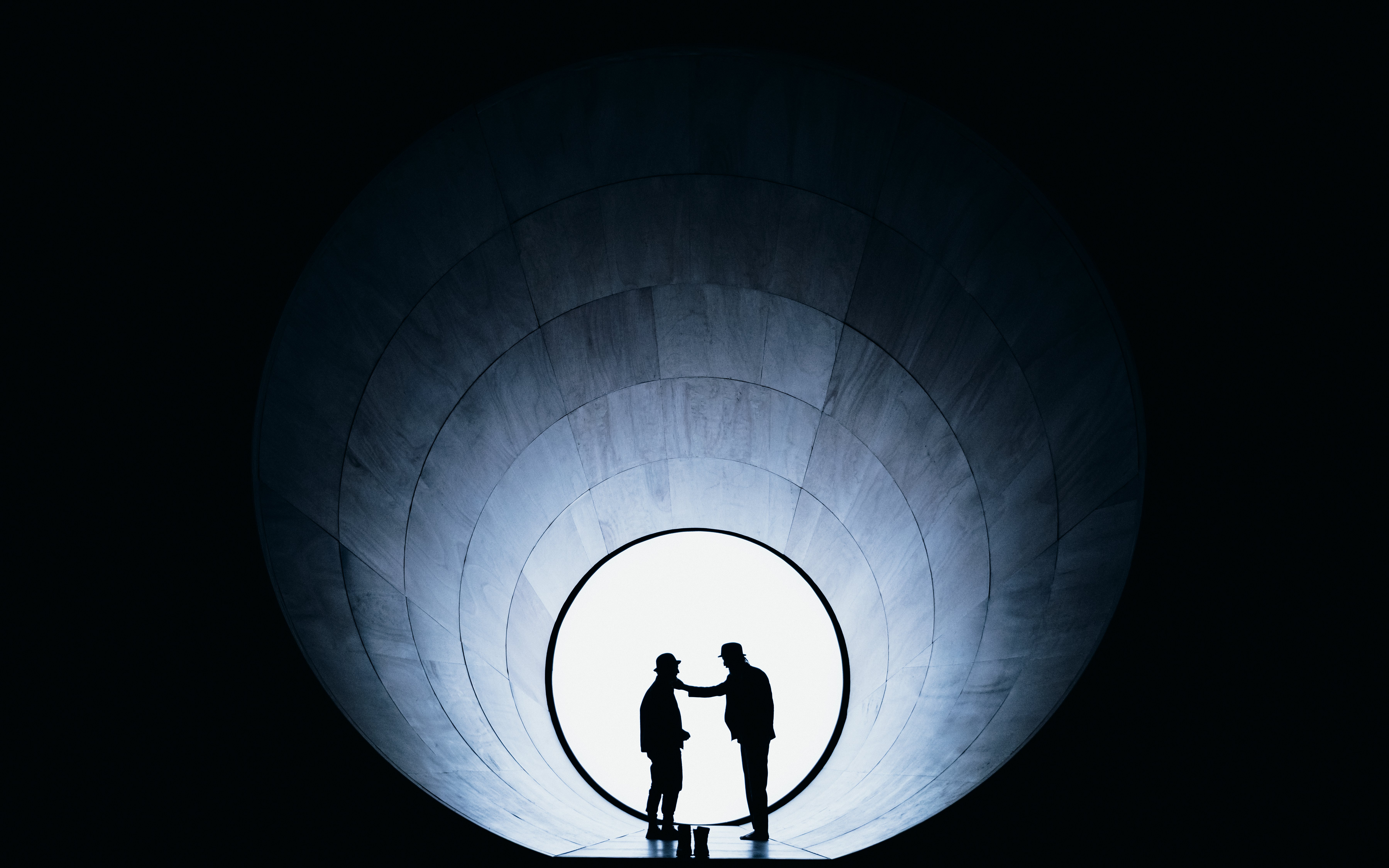 Silhouettes of two actors on stage during Waiting for Godot Broadway show.