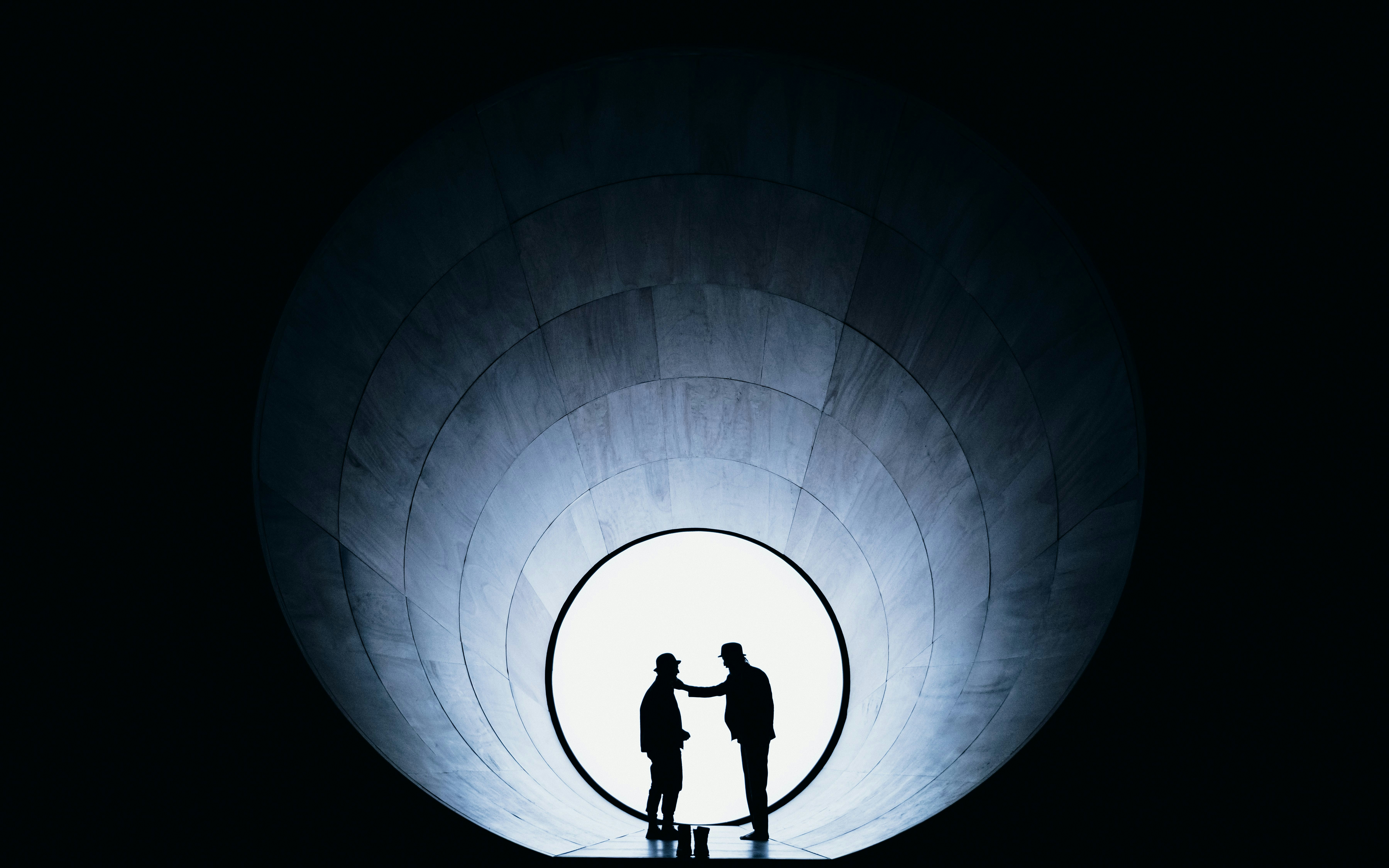 Silhouettes of two actors on stage during Waiting for Godot Broadway show.