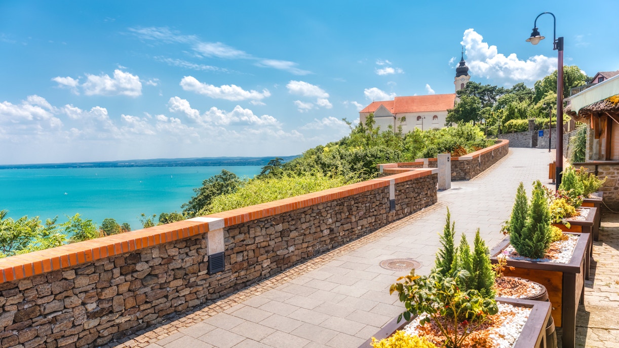 Tihany Peninsula path with view of Benedictine Abbey and Lake Balaton, Hungary.