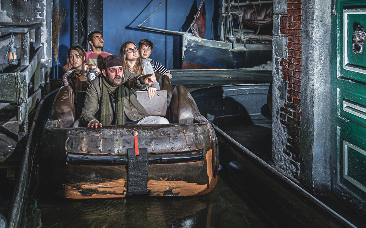 Boat ride through eerie setting inside Hamburg Dungeon.