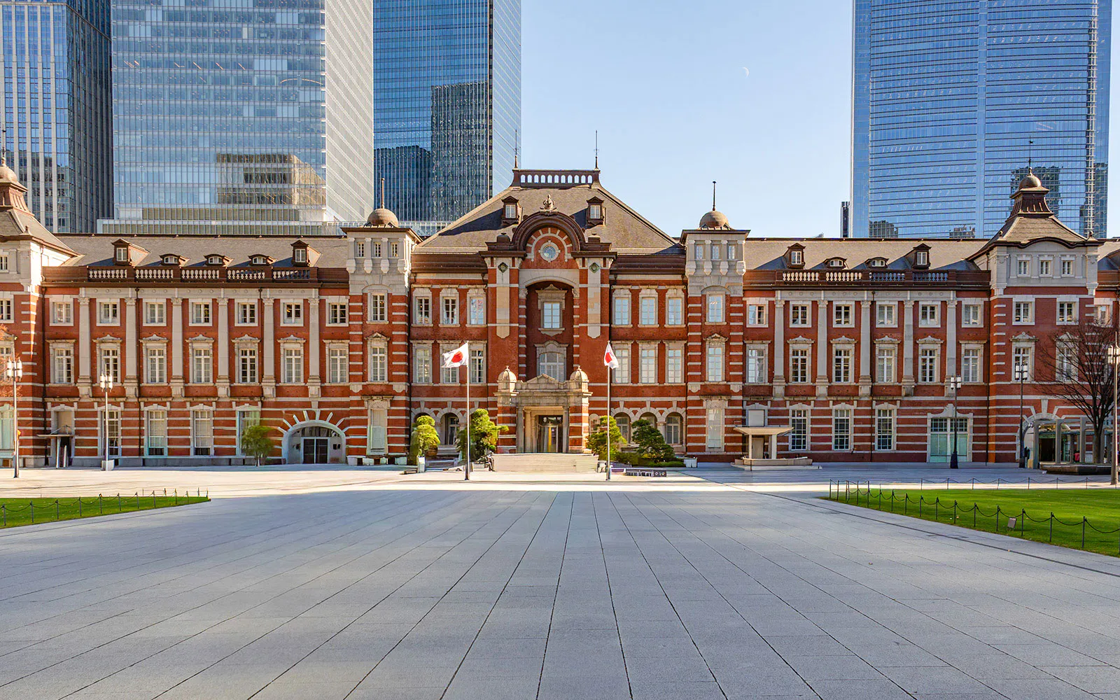 Tokyo Station with red brick facade and plaza, Tokyo, Japan.