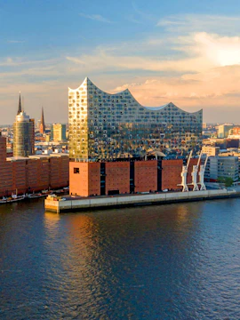 Panoramic view of the Elbphilharmonie concert hall in Hamburg, Germany, by the river.