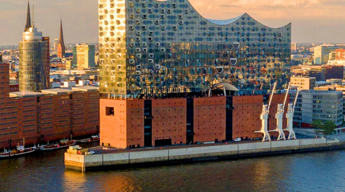 Panoramic view of the Elbphilharmonie concert hall in Hamburg, Germany, by the river.