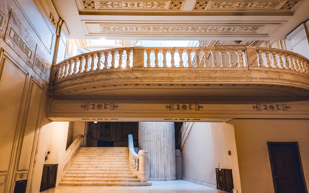 Grand marble staircase inside the Palace of Parliament, Bucharest.