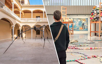 Picasso Museum Malaga courtyard sculpture and visitor viewing art installation.