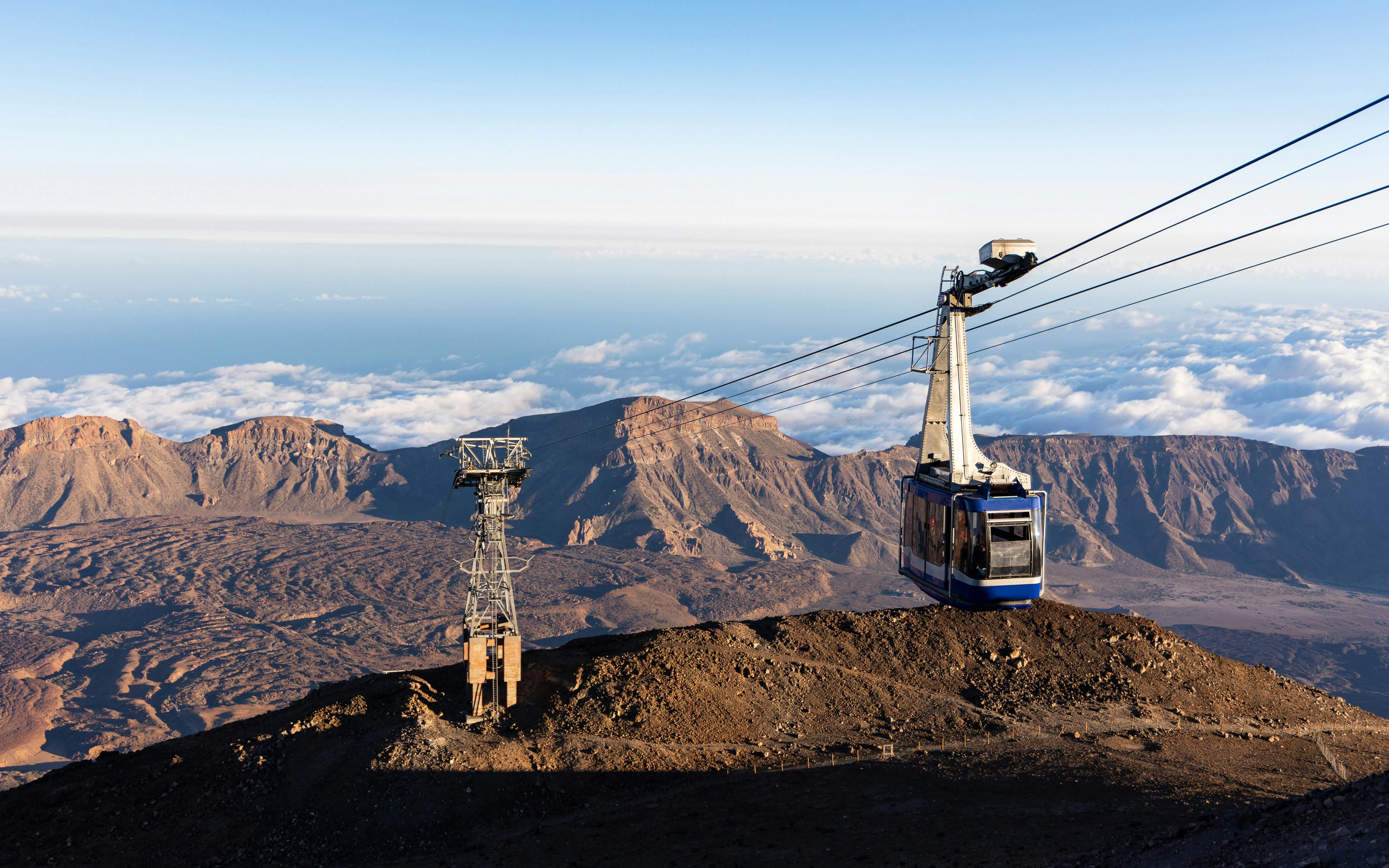 Cable car ascending Mount Teide with caldera view, Teide National Park, Tenerife, Spain.