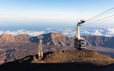 Cable car ascending Mount Teide with caldera view, Teide National Park, Tenerife, Spain.