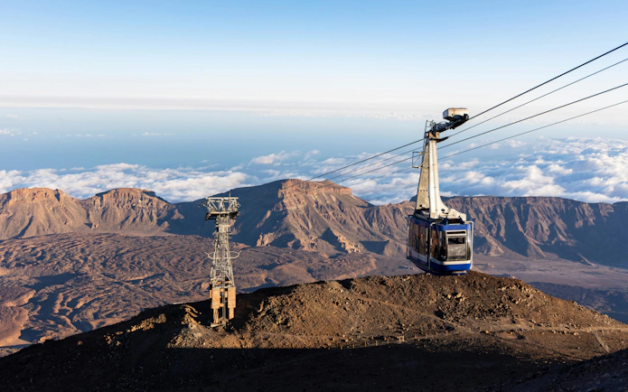 Cable car ascending Mount Teide with caldera view, Teide National Park, Tenerife, Spain.