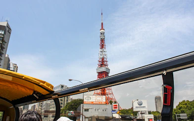 Tokyo Tower viewed from an open-top bus on a hop-on hop-off tour.