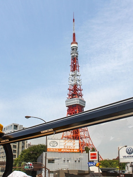 Tokyo Tower viewed from an open-top bus on a hop-on hop-off tour.