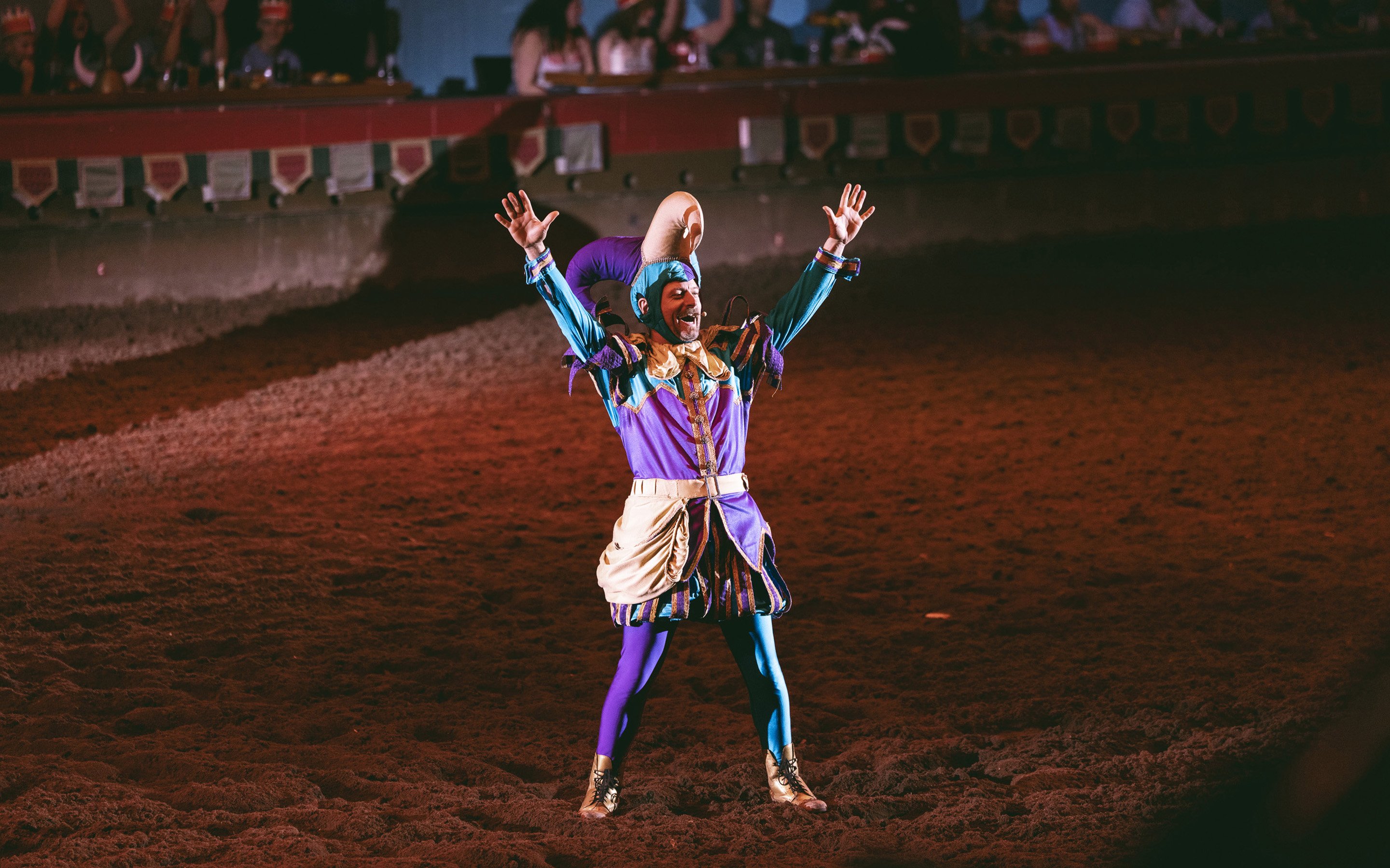 Performer in colorful costume at Tournament of Kings show, Las Vegas.